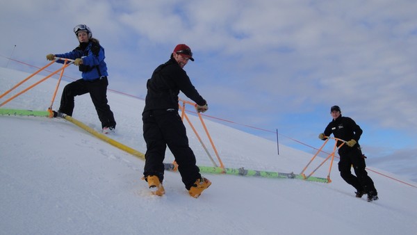  The Race and Events team led by Richard Murphy (right) carry out snow injections at Coronet Peak.